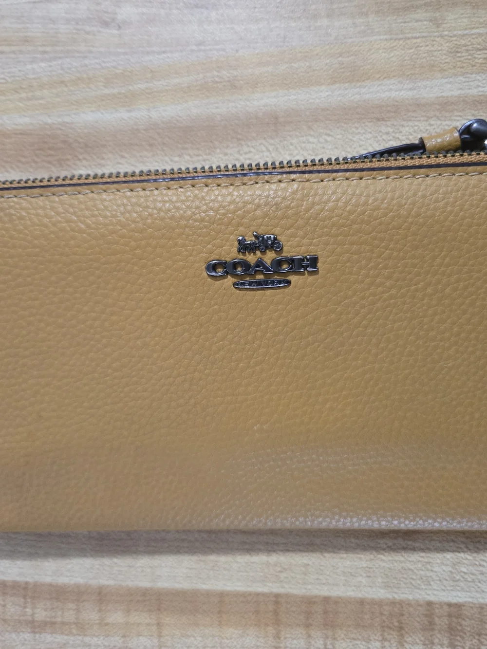 Coach Pebbled Leather Wristlet in Mustard Yellow with Gunmetal Logo